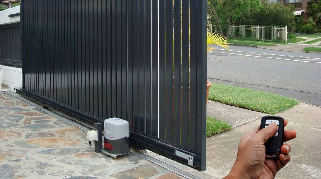 A modern automated gate system installed on a residential driveway by Local Garage Door Repair Services Sarasota.