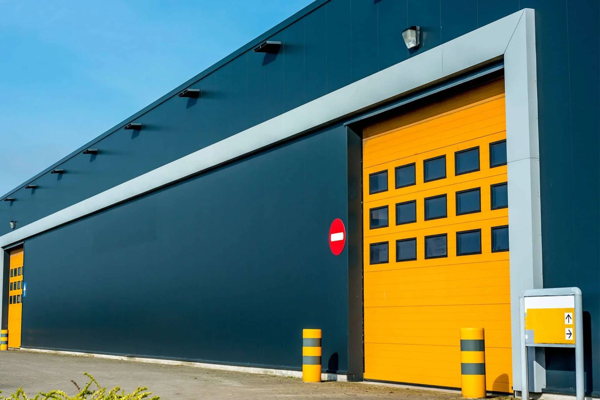 Emergency Commercial Garage Door Repairs: How to Fix a Broken Spring or a Door Off Track