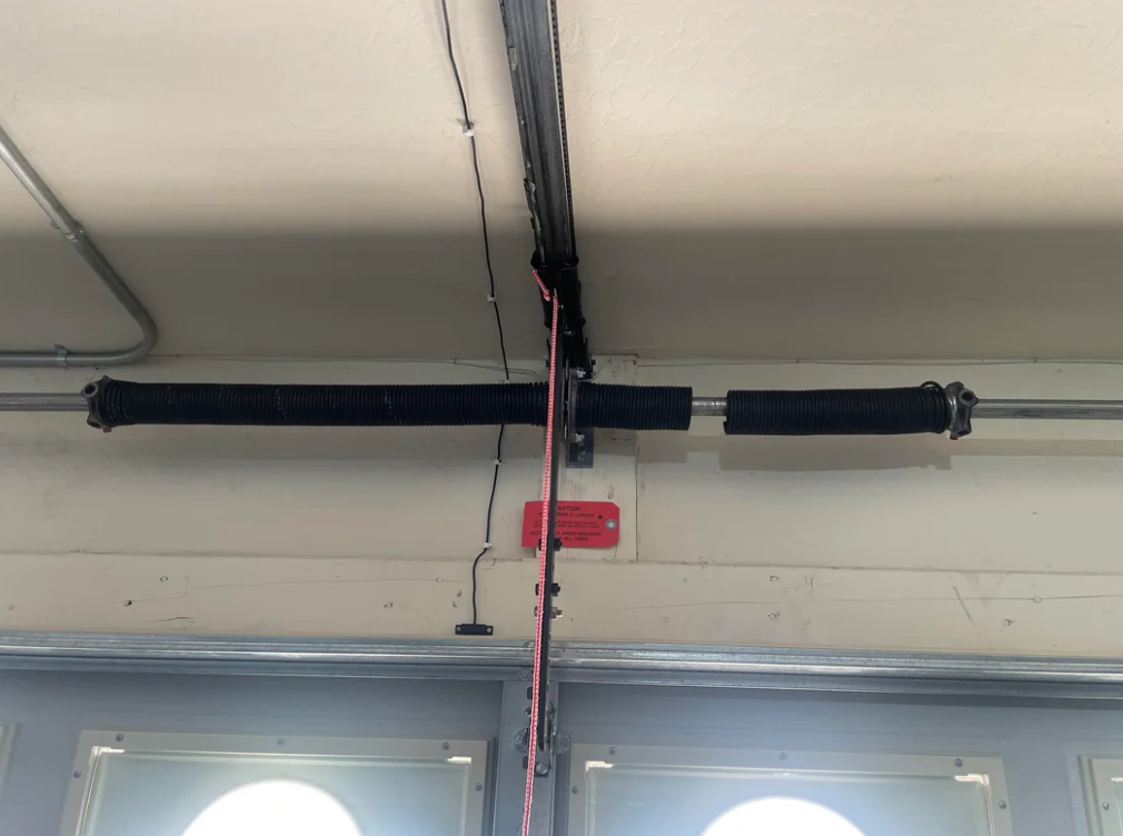 Garage door spring repair in Sarasota, FL.